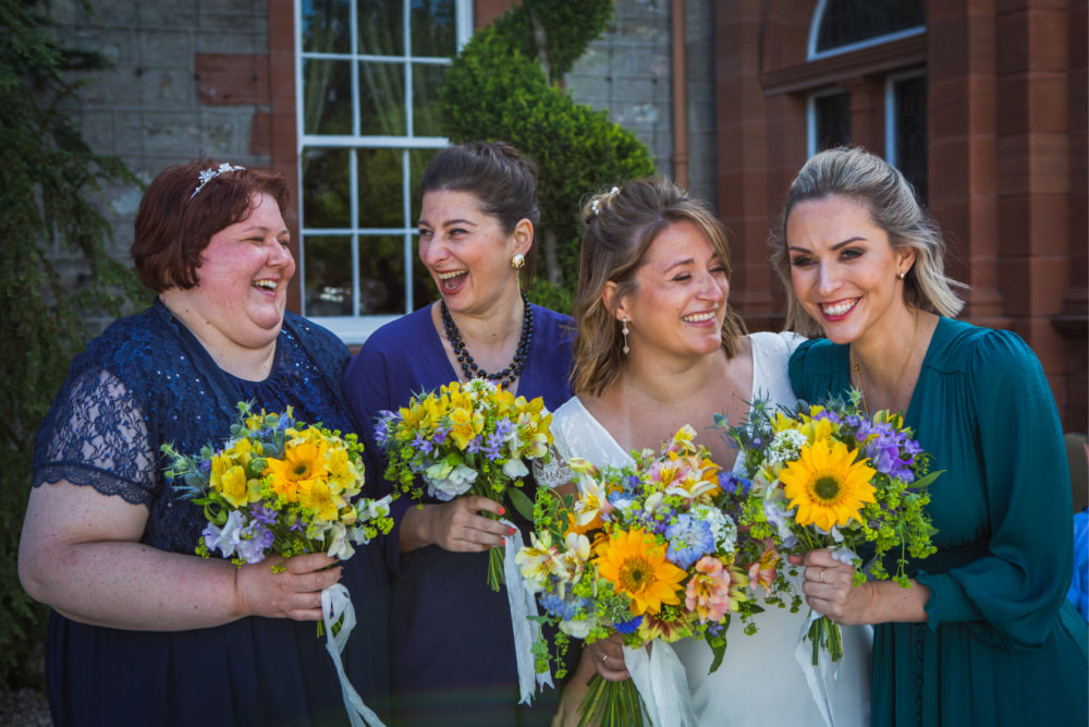 Sunflower Wedding at Mabie House Hotel, Dumfries. Bride with Bridesmaids with Sunflower, Scabious & Sweet Peas. Flowers grown locally & arranged by Rosie Gray, www.GallowayFlowers.co.uk