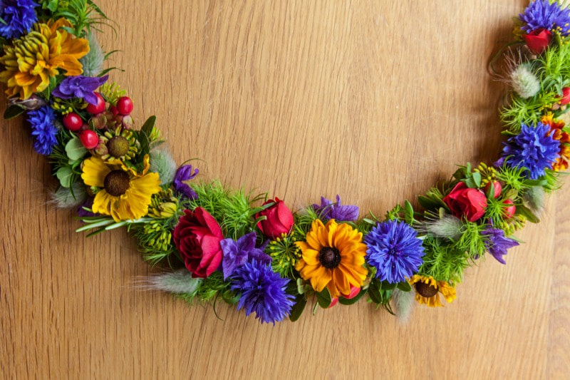Flower crown made in rich bright colours red, gold & blue for a September Bride copyright www.GallowayFlowers.co.uk