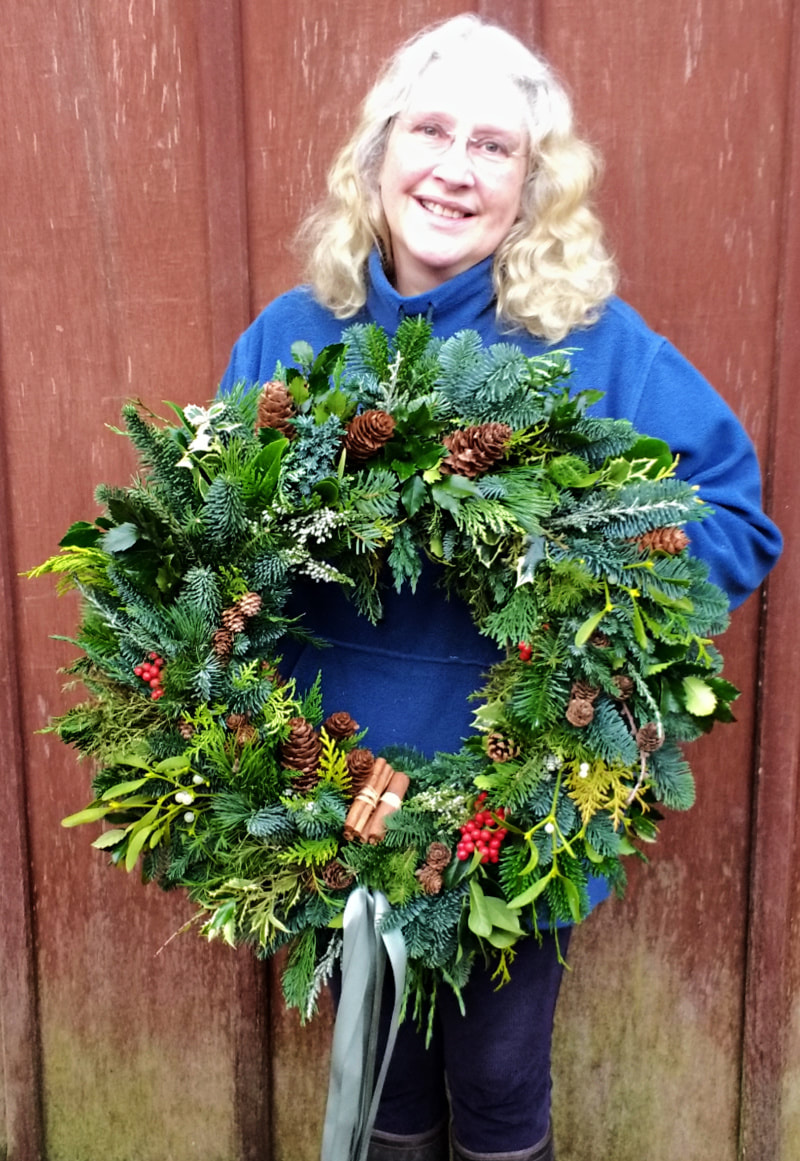 Rosie Gray, Galloway Flowers with handmade Christmas Wreath copyright www.GallowayFlowers.co.uk