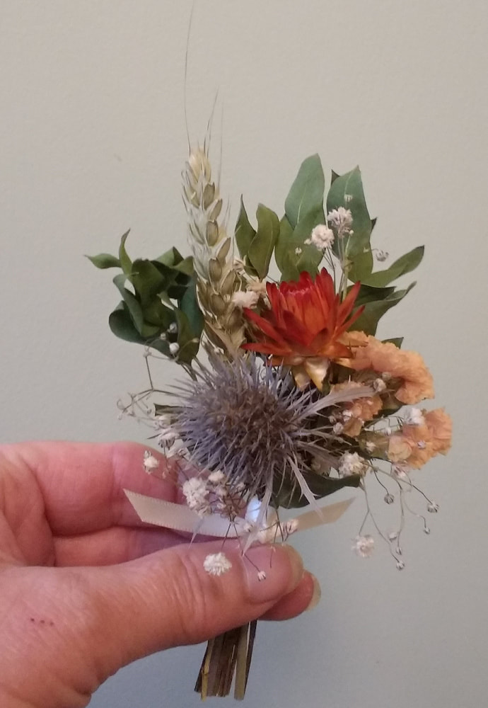 A Grooms Buttonhole made from Scottish-grown dried flowers in Autumn colours. Copyright www.GallowayFlowers.co.uk