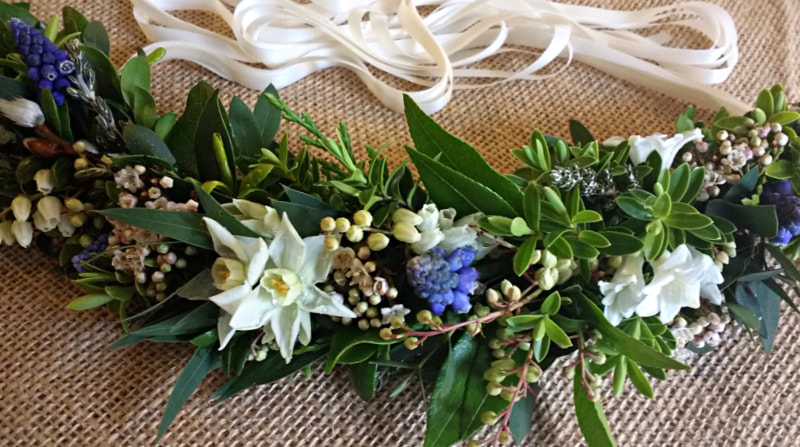 Flower Crown of natura; white & blue Spring flowers with green foliage. Copyright www.GallowayFlowers.co.uk