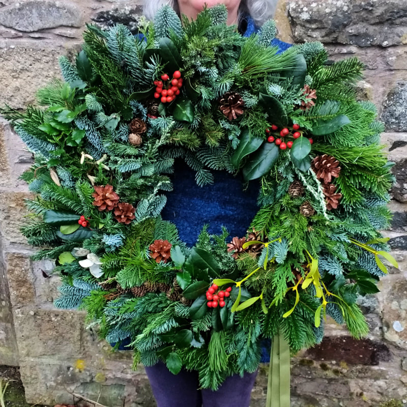 Giant Christmas Wreath of conifers, everfreens, berries & cones, florist castle douglas, florist dumfries & galloway copyright www.GallowayFlowers.co.uk