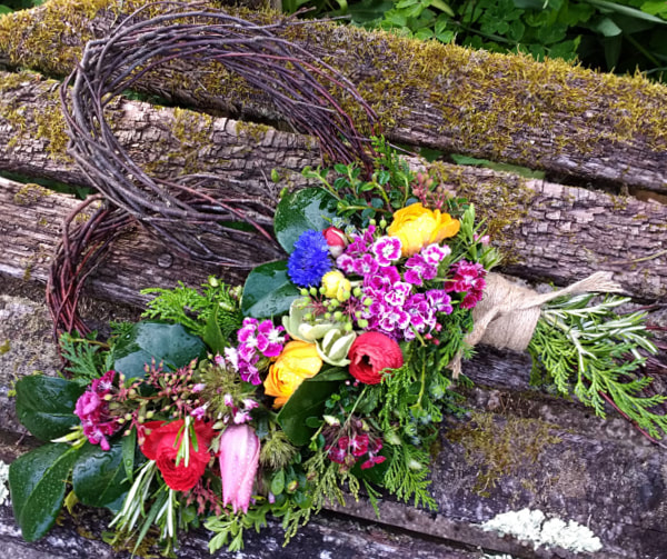 Heart Wreath in bright colours copyright www.GallowayFlowers.co.uk