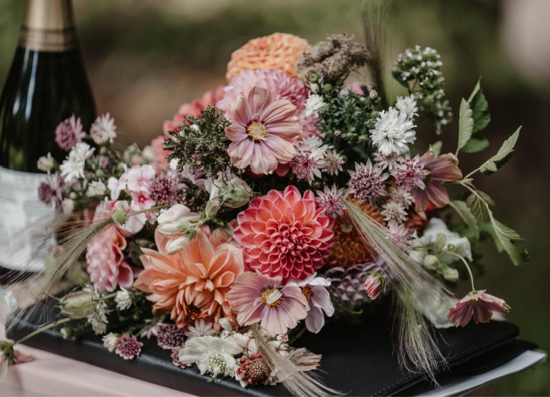 Autumn bridal bouquet in muted peach, caramels & cream including Dahlias, Cosmos & grasses by Galloway Flowers. Photo copyright Willow & Wylde