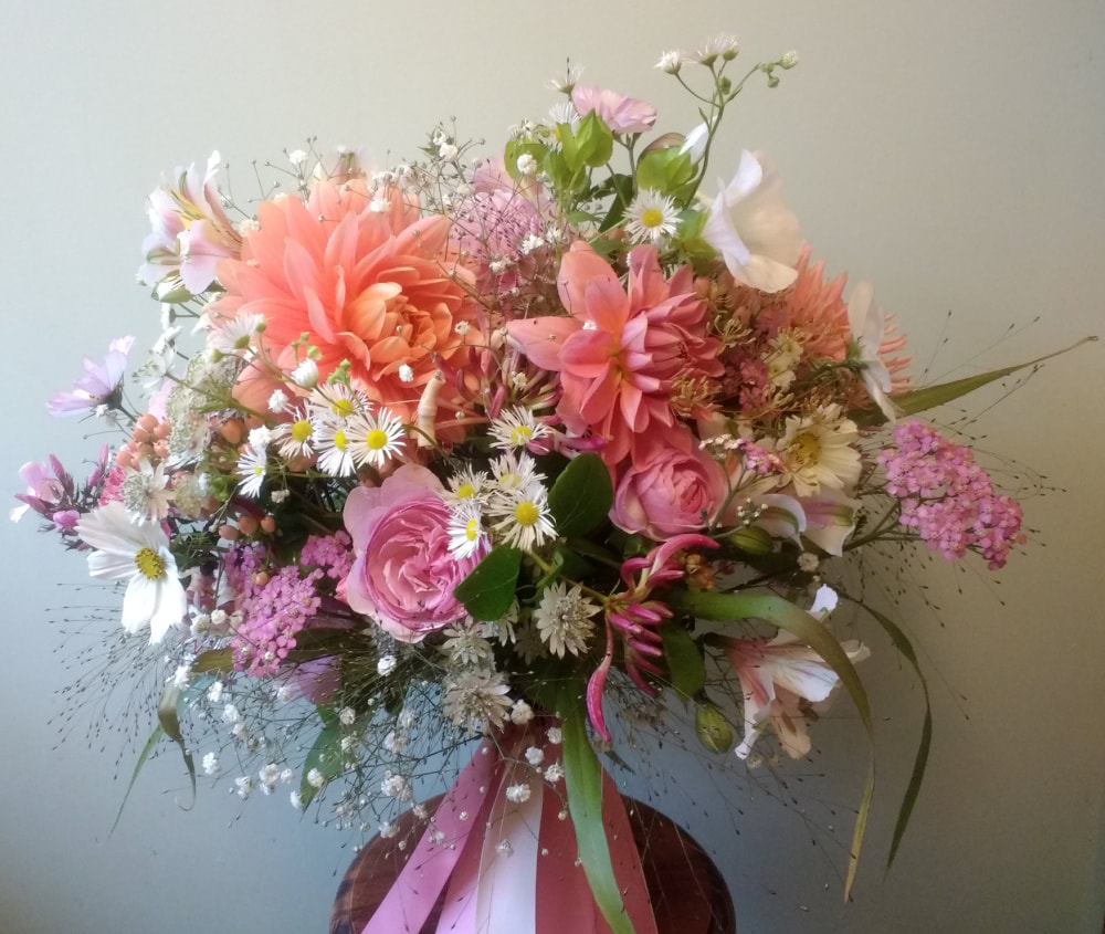 A Romantic Bridal bouquet of locally grown, seasonal flowers in peachy pinks & white. Copyright www.GallowayFlowers.co.uk