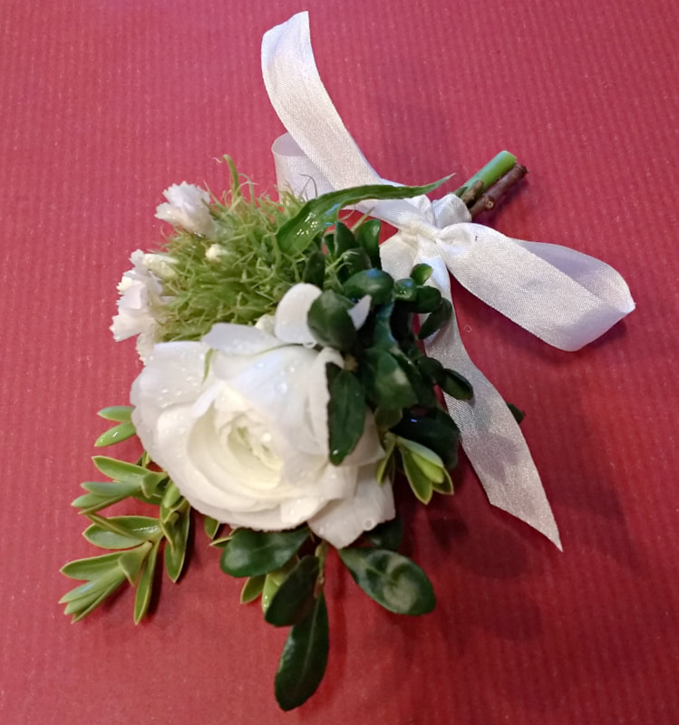 White Corsage of Spring flowers copyright www.GallowayFlowers.co.uk
