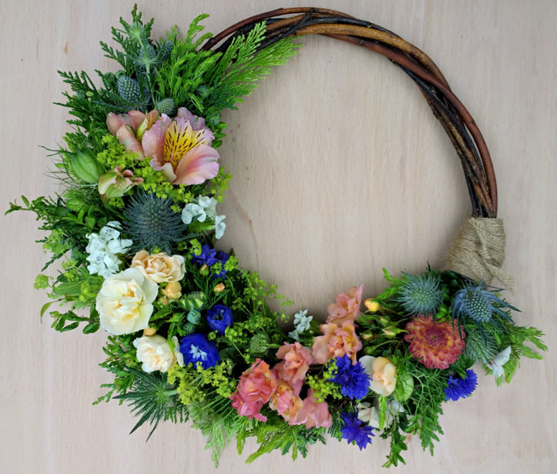 Natural Willow Wreath with garden flowers copyright www.GallowayFlowers.co.uk